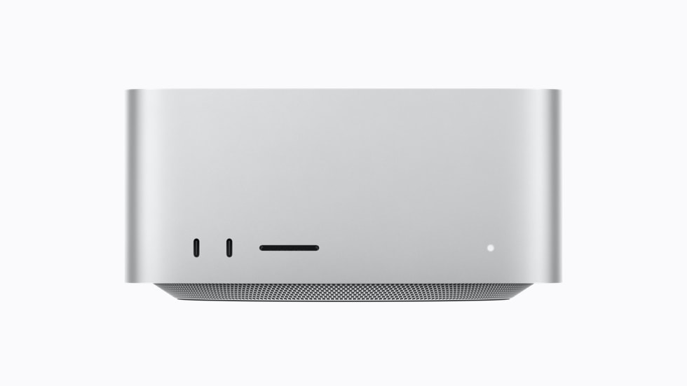 The new Mac Studio, a compact aluminium desktop computer, shown on a desk