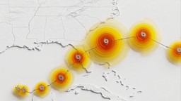 Visualization of a tropical cyclone track crossing the Gulf of Mexico and Florida, with concentric orange and yellow rings at each forecast point representing the spread of ensemble predictions for storm position and size.