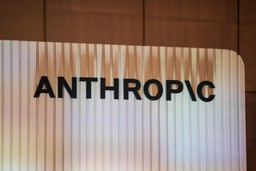 Anthropic company logo on a wall