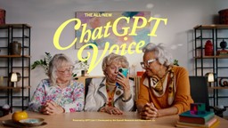 Three older women sitting at a table looking at a smartphone, under the campaign title The All-New ChatGPT Voice, powered by GPT-Live-1